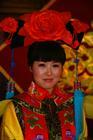 beautiful chinese bride - there are 55 ethnic groups besides the Han people, who are the mojority. each has its own wedding custom and costume. this is one of them. beautiful, isn&#039;t she?