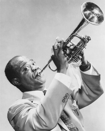Louis Armstrong - Louis Armstrong was the first important soloist to emerge in jazz, and he became the most influential musician in the music's history. As a trumpet virtuoso, his playing, beginning with the 1920s studio recordings made with his Hot Five and Hot Seven ensembles, charted a future for jazz in highly imaginative, emotionally charged improvisation. For this, he is revered by jazz fans. But Armstrong also became an enduring figure in popular music, due to his distinctively phrased bass singing and engaging personality, which were on display in a series of vocal recordings and film roles. Armstrong had a difficult childhood. William Armstrong, his father, was a factory worker who abandoned the family soon after the boy's birth. Armstrong was brought up by his mother, Mary (Albert) Armstrong, and his maternal grandmother. He showed an early interest in music, and a junk dealer for whom he worked as a grade-school student helped him buy a cornet, which he taught himself to play. He dropped out of school at 11 to join an informal group, but on December 31, 1912, he fired a gun during a New Year's Eve celebration, for which he was sent to reform school. He studied music there and played cornet and bugle in the school band, eventually becoming its leader. He was released on June 16, 1914, and did manual labor while trying to establish himself as a musician. He was taken under the wing of cornetist Joe "King" Oliver, and when Oliver moved to Chicago in June 1918, he replaced him in the Kid Ory Band. He moved to the Fate Marable band in the spring of 1919, staying with Marable until the fall of 1921. Armstrong moved to Chicago to join Oliver's band in August 1922 and made his first recordings as a member of the group in the spring of 1923. He married Lillian Harden, the pianist in the Oliver band, on February 5, 1924. (She was the second of his four wives.) On her encouragement, he left Oliver and joined Fletcher Henderson's band in New York, staying for a year and then going back to Chicago in November 1925 to join the Dreamland Syncopators, his wife's group. During this period, he switched from cornet to trumpet. Armstrong had gained sufficient individual notice to make his recording debut as a leader on November 12, 1925. Contracted to OKeh Records, he began to make a series of recordings with studio-only groups called the Hot Fives or the Hot Sevens. For live dates, he appeared with the orchestras led by Erskine Tate and Carroll Dickerson. The Hot Fives' recording of "Muskrat Ramble" gave Armstrong a Top Ten hit in July 1926, the band for the track featuring Kid Ory on trombone, Johnny Dodds on clarinet, Lillian Harden Armstrong on piano, and Johnny St. Cyr on banjo.

