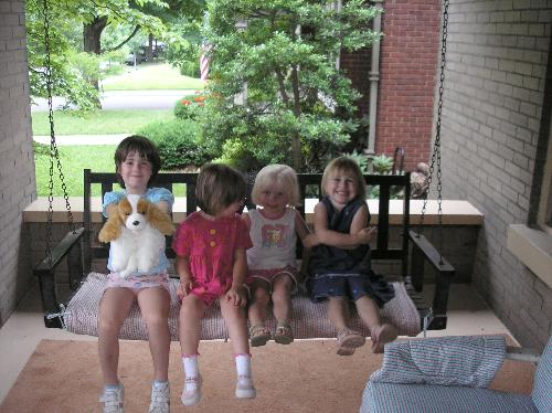 Girls on a swing - Sarah Sara Evalyn and Katie on a swing with dog