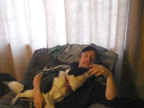 Me and my loyal buddy! - This is a picture of me, Mike Rix with my dog Slider! Slider is very loyal and he likes to go for car rides. Slider warned us once when aburglar was sneaking around so I gave him anice juicy T- BONE STEAK.