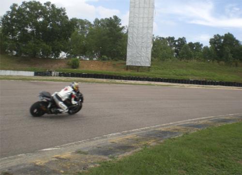My friend on his gsxr 1000 taking his first turn - He used a old tire on track and worrying for his safety though it not as low as i thought!