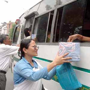 collecting donation - Members of a socio-cultural organisation collecting donation from public in Guwahati on Saturday for flood affected people of the State of Assam.