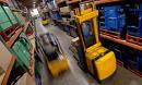 Warehouse - Two fork lifts.