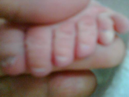 sharing the secret. - a 6 finger foot.