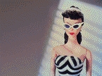 Barbie sunning  - remember when, her outfits should make a come back she was always in style