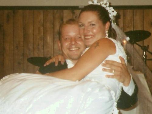 Jamie and I - this is the happiest day of my life August 9, 2003, the day that i married my one true love....all though during the ceramony it was storming like crazy, very hot in the church. but when we walked out the sun came out and it was beautiful....