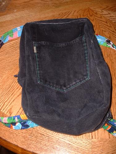 Matthew's bookbag - It's hard to see the pocket, but it's the actual pocket from the jeans. There wasn't much left over from the pair of jeans by the time we were done cutting them out!