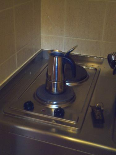 An italian moka in its 'natural habitat' - Here we can see the ultimate resource for a coffee-addict man who is in a summer holiday and has to prepare his delicious beverage by himself: the results are not always satisfactory. In general you need a cafeteria!
