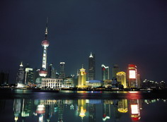 Shanghai - The photo is about a beautiful scenery of Shanghai. You can see the sky is black but the Oriental Pearl Tower and other big buildings are steadily standing there. How glorious!