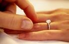 Ring - You can see that a man is putting a ring on a woman's hand.I think they must be lovers.Becanse I can imagine the feeling and tenderness between the flash of that moment.