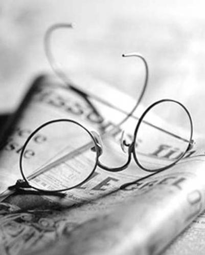 eyeglasses - eyeglasses worn when reading. they are customized to fit a person's vision depending on the damage.. whether near-sighted or far-sighted.
