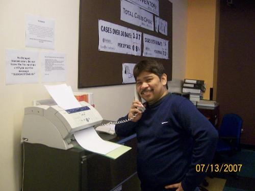 me faxing - posing beside fax machine