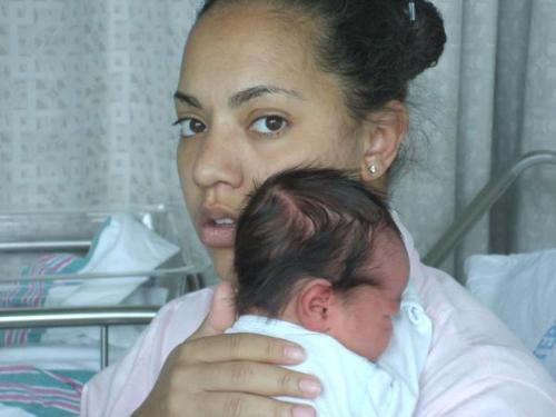 Just a few hours old - This is our first picture together, he was about 3 hours old.