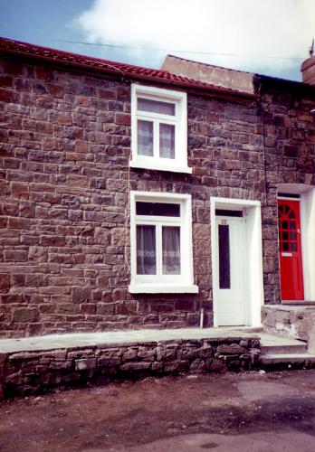 The outside of the cottage - This is the outside of my cottage. It is a typical miner's cottage here in the Valleys of South Wales.