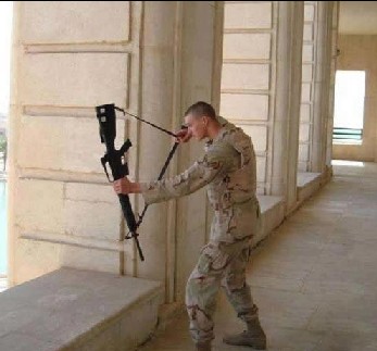 Crazy soldier - a soldier is using his M16 as a bow
