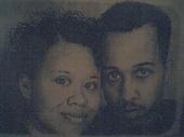 samantha and tyson - This picture was take back in 99 when first started dating. I really love this picture, as it was taken on one of those machines that does hand drawn work.