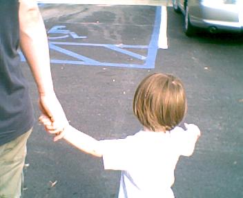 walking with daddy - my cute little boy and his daddy walking