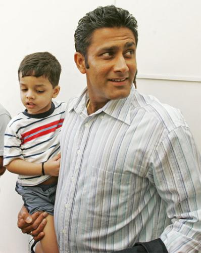 Anil with his son - Anil the bowler