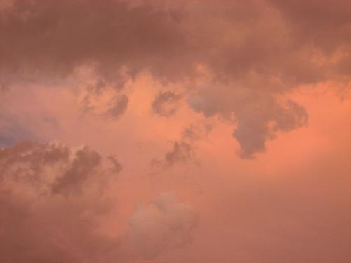 orange glow - Another early shot of the sunset and approaching storm.