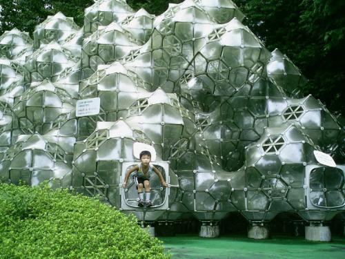 Hakone Open Air Art Museum - This shot was taken in Tokyo Japan at the Hakone Art Museum. It is near Mount Fuji. I was lucky to be able to get the kid at the right spot at the right time. This is one of the art installations.