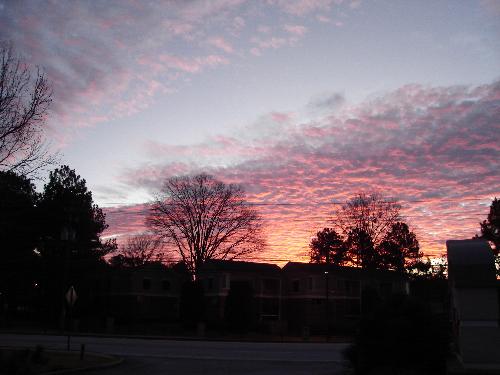 Sunrise in Atlanta, GA From My Favorite Getaway - This picture of a beautiful, early sunrise was taken with a Sony Digital Camera sometime in late 2006. This was an early December morning as I recall, because I was eating breakfast at my favorite getaway, The Galaxy Diner (www.galaxydineratlanta.com) in Atlanta, GA. I thought this was such a beautiful sky that it would make a great picture.  I hope you find this enjoyable and relaxing.