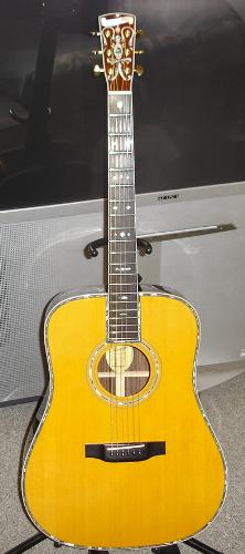 Blueridge BR180 - This is a Blueridge BR180,it is made in China,it is a copy of a D45 Martin.I have owned several Martins and this guitar is equal in tone to any of them.A D45 Martin sells for around $7,000.00 a BR180 Blueridge sells for around $1,400.00 it has abalone inlay everywhere like the Martin D45