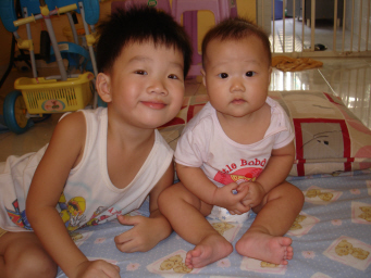 My little prince and princess - This are my two little darlings, Darryl and Dyllis of age 3 and 6mths old at the time of August 2007 :)   Darryl likes to take picture and can post well.. He must be in the picture whenever or whatever i wanna take any pix. Oh boy! hahaha...