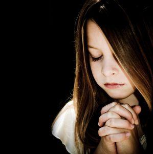 Prayer to God - the little girl is saying a prayer. the best way of communicating with God is thru prayers. Prayer to God - the little girl is saying a prayer. the best way of communicating with God is thru prayers.