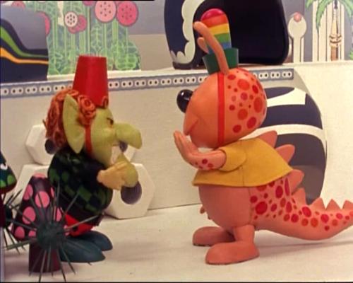 A witch and a happiness dragon - Fenella, the Welsh witch, and Chorlton, the happiness dragon, have a tete-a-tete.