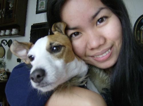 me and my baby jackie - This is me with my baby jackie, she's just the sweetest cutest puppy in the whole world for me.. and i love her!