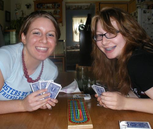 board games - In this photo I am learning how to play cribage with my sis. I love board games so it's always great to learn how to play a new one.
