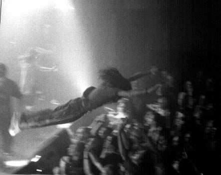going crazy at a concert - jumping from the stage at the concert