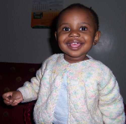 Fast learning to speak, at only 1 yr 5 months! - Little wonder, she can express hersself linguistically.