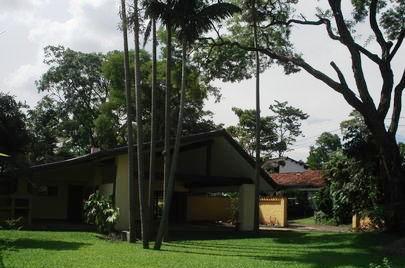 House - A house among green.