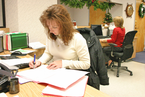 Hard at work - Desk jobs are boring.