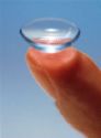contact lens - Contact lenses are small plastic discs shaped to correct an eyesight problem such as nearsightedness, farsightedness, or astigmatism. These are called refractive errors. They may also be used by people who have had surgery for cataracts. 

Contacts are placed directly on the eye, where they float on a film of tears in front of the cornea. Correct design and fitting of the lenses are essential for comfort, safety, and accurate correction.

Improvements in contact lenses have made them more comfortable and easier to wear. In the United States, 29 million people wear contact lenses; most wear soft lenses. For these people, contact lenses offer a relatively safe and effective way of correcting vision problems. 

Several types of contact lenses are available to correct nearsightedness. Contact lenses are needed after cataract surgery if an artificial lens cannot be implanted in the eye. 

