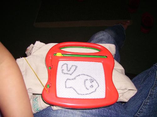 a fish - this is a picture of a fish and a heart my 4 year old daughter drew on the magnadoodle.