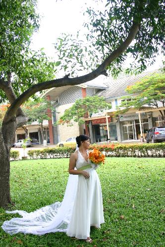 wonderful day - hmmm... just try to look back if there were still men running after me! hehehe   Taken during the prewedding photo-ops. I have tried so much to find the right angle for my figure and have tried dieting to lose a few lbs and desperately asked the photographer to instruct me properly so I'd look good! Guess what! Notice how the gown made the difference??   Thank you Lia (my bestgurlfriend) for creating the reality of my imagination.