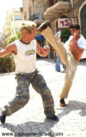 Capoeira add - This Photo was taken from an add mad for mineral waters, which broadcast in the Israeli TV. those two are awesome!!! - one of them is my Mastre.. (Teacher).