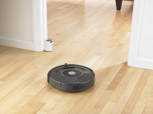 iRobot's new 'robust' Roomba - While previous incarnations of the Roomba did allow for virtual walls to restrict where the robot could travel, the Roomba 560 works by what iRobot refers to as lighthouses. These are beacons that can be put in places like doorways to automatically communicate with the Roomba whenever it's on. Each lighthouse beacon takes two C batteries and can instruct the Roomba to finish cleaning one room completely before moving on to the next and then guide it back to its home base for recharging when it's done. As with the virtual walls, the lighthouse beacons can also bar the Roomba from a room completely. Using the lighthouse system, the Roomba 560 takes about 35 minutes to clean one room, according to Preneta.