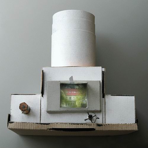 Home made Cardboard reflex camera.  - Home made card board reflex camera. I have got this image from a friend. Is it possible to made it in home?