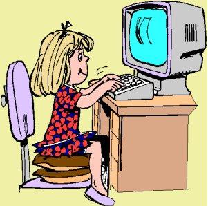 using computer - A picture of a girl using her computer at home.