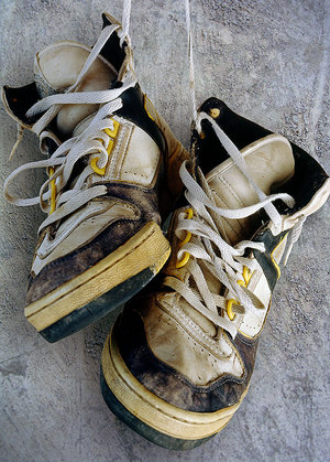 Shoes - An old basketball shoes, wornout and dried through time.