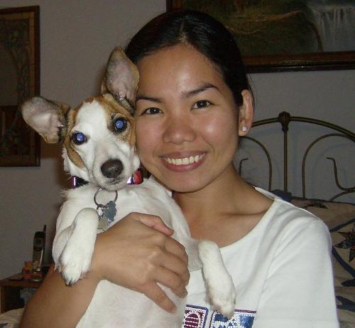 claire with jackie - this is my new pic with my cute puppy 'jackie'. we are just inside the room playing and watching tv. She's camera shy sometimes. hehehe..