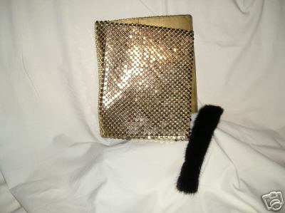 Diary cover - Cover for diary in gold metal mesh on leather. The book mark is of dark brown mink fur, with a satin ribon inside.