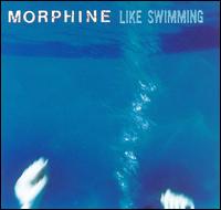 Morphine_-_Like_Swimming - Morphine combined blues and jazz elements with more traditional rock arrangements, giving the band a very unusual sound. Sandman's distinctive singing was described as a 'deep, laid-back croon'[1], and his songwriting featured a prominent beatnik influence. When asked by reporters to describe their music, the band created the label 'low rock'. One critical appraisal suggests that 'Morphine immediately established a minimalist, low-end sound that could have easily become a gimmick: a 'power trio' not built around the sound of an electric guitar. Instead, with sly intelligence, Morphine expanded its offbeat vocabulary on each album.'[2]  Although Morphine was critically lauded throughout their career, it is difficult to measure their success commercially. In the United States the band was embraced and promoted by the indie rock community, including public and college radio stations and MTV's 120 Minutes (which the band once guest-hosted), but received little support from commercial rock radio and other music television programs. This limited their mainstream exposure and success in their home country, while internationally they enjoyed mainstream success and support, especially in France and Australia.