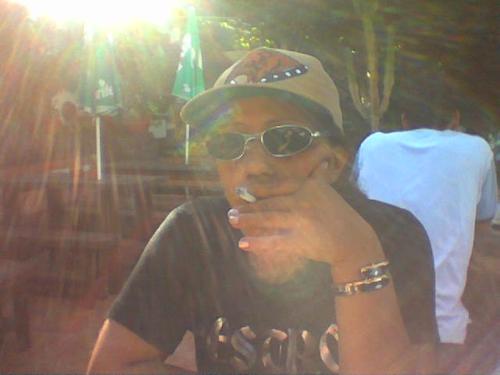 me in Tenerife - me sitting and smoking in a bar in Tenerife me in Tenerife - me sitting and smoking in a bar in Tenerife