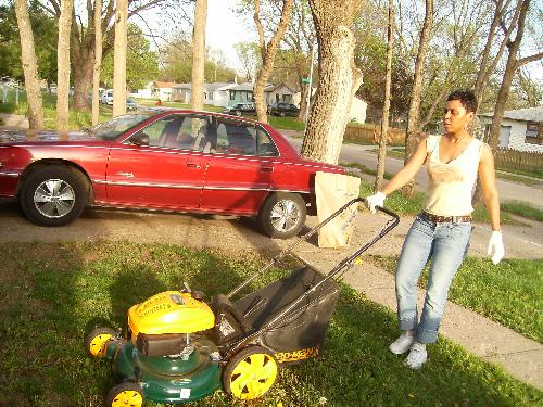 Independent woman at work - Can you cut my grass too?