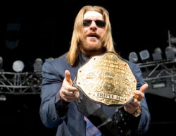 Triple H - Triple H holding the title.