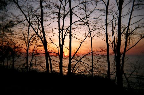 Lake Michigan Sunset - This is an early-spring picture of the sunset over Lake Michigan taken from Indiana Dunes National Lakeshore in Northwest Indiana.  Anyone who is in the area should visit both Indiana Dunes National Lakeshore and Indiana Dunes State Park.